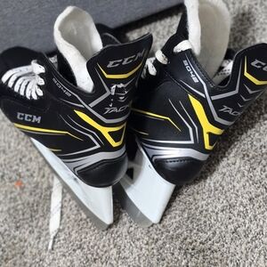 CCM Youth Black and Yellow Ice Skates